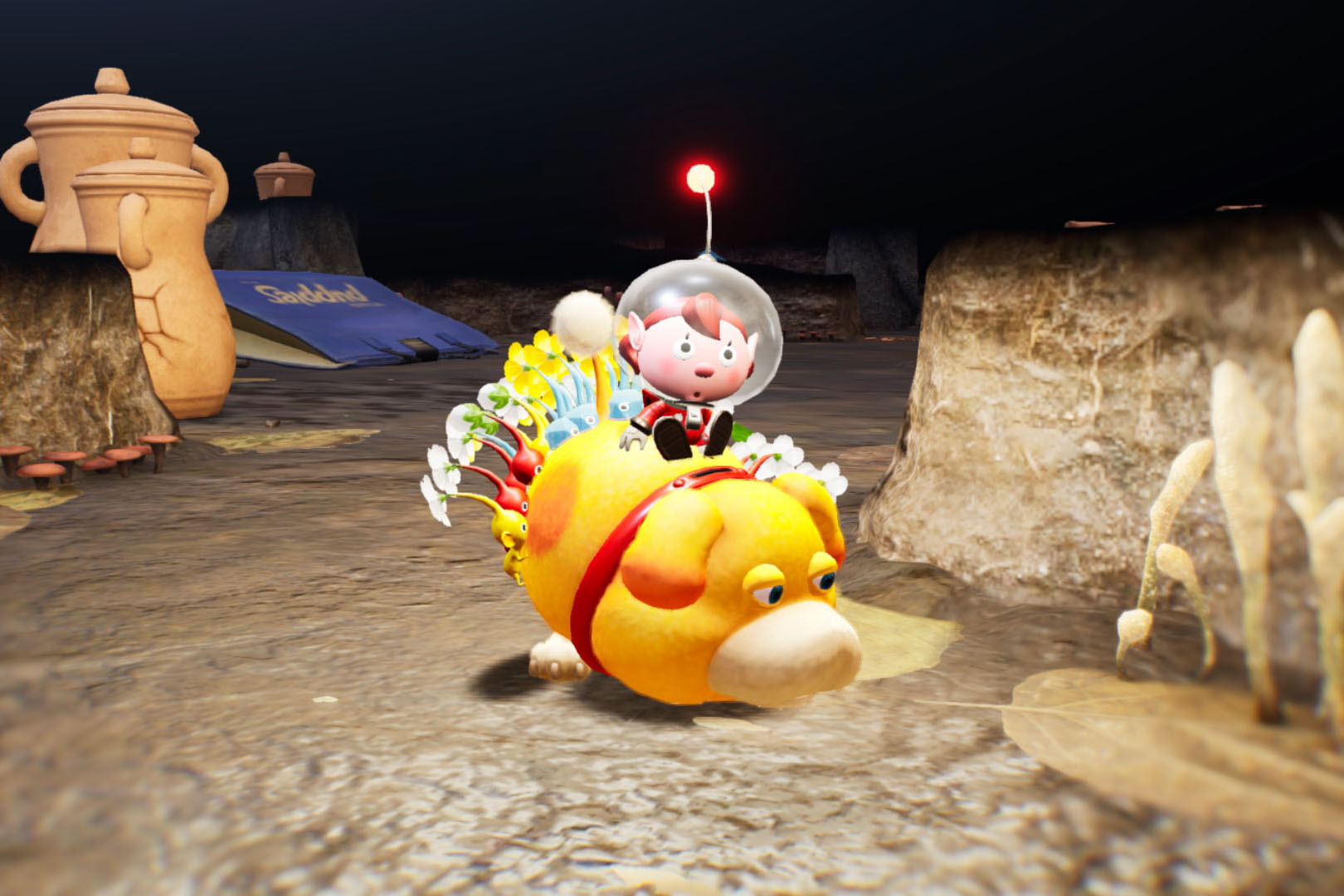 Игрок управляет крошечными существами, исследуя садовый мир и решая головоломки.
Источник: видеоигра Pikmin 4